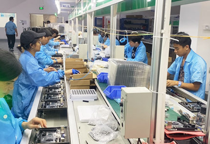 How is a computer motherboard manufactured?